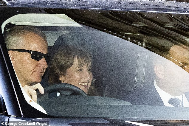 Reeves is pictured smiling as she leaves Downing Street on Thursday