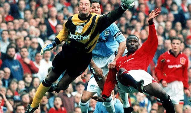 Ex-Manchester City goalkeeper Eike Immel (left) is now set to go to prison due to fraud