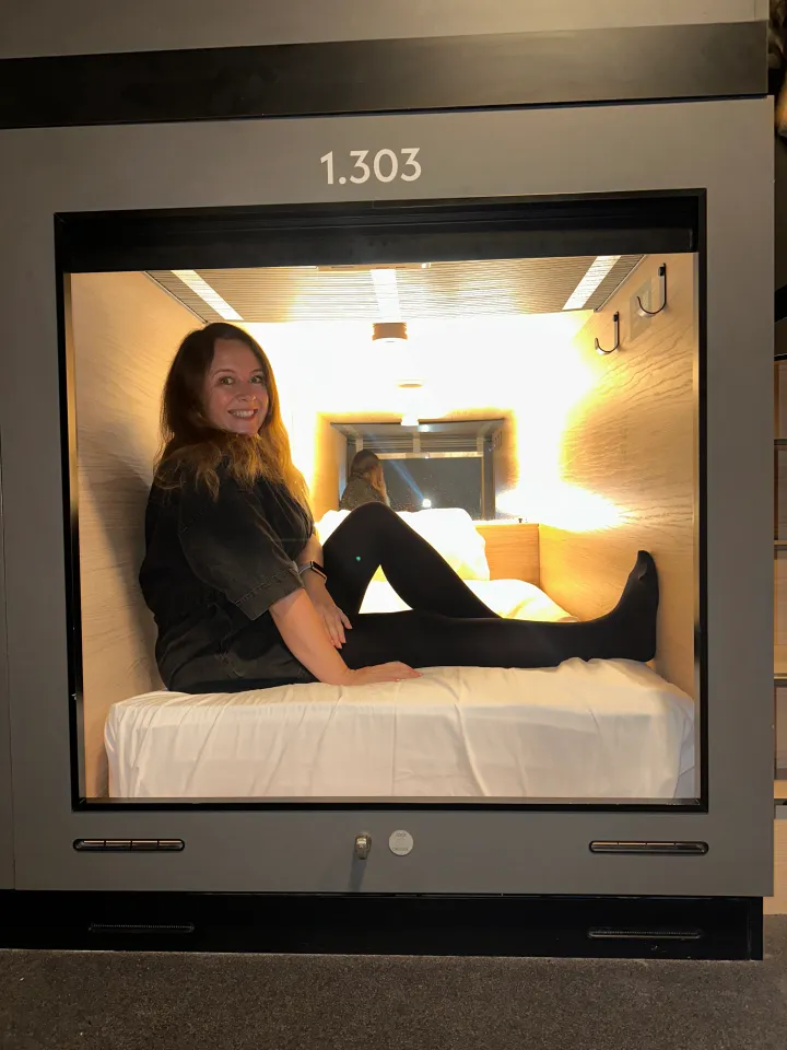 A woman in a Zedwell capsule.