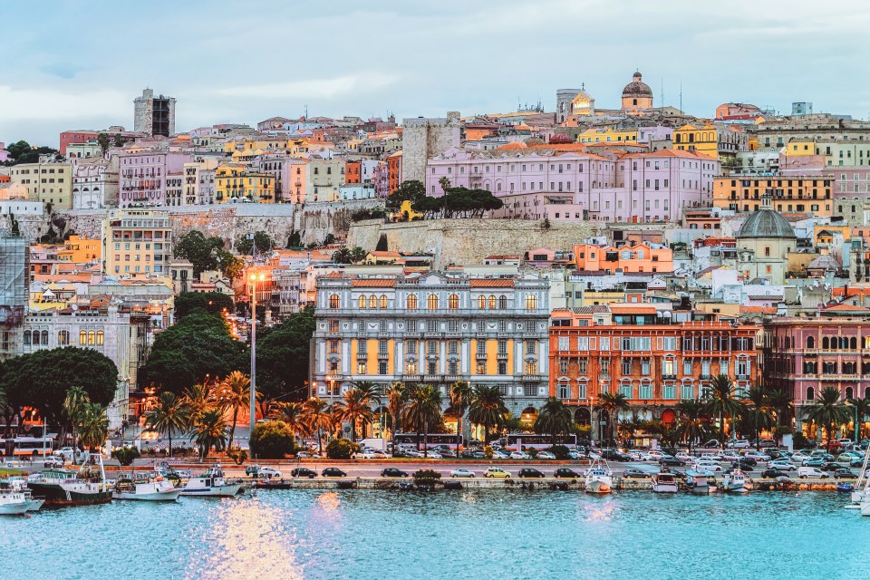 Cagliari cityscape and architecture with the Mediterranean Sea.