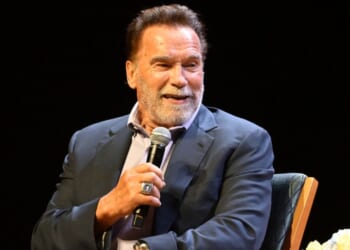 Arnold Schwarzenegger speaks at Chapman University in Orange, California, on Tuesday.