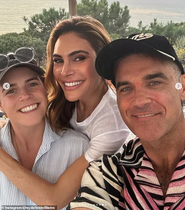 Princess Eugenie beamed in a selfie with Robbie and Ayda Williams - and is believed to have hosted them in her Portugal home in August