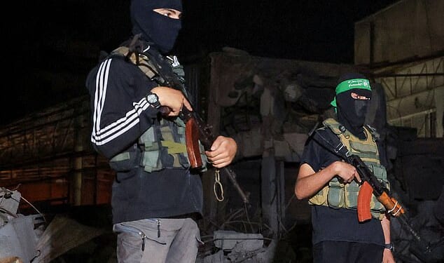 Israel has launched an attack in Gaza after claiming Hamas violated the Donald Trump-brokered peace deal. (Hamas gunmen pictured on October 15)