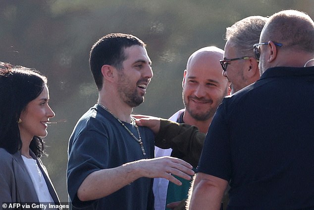 Elkana Bohbot was seen hugging authorities after his release