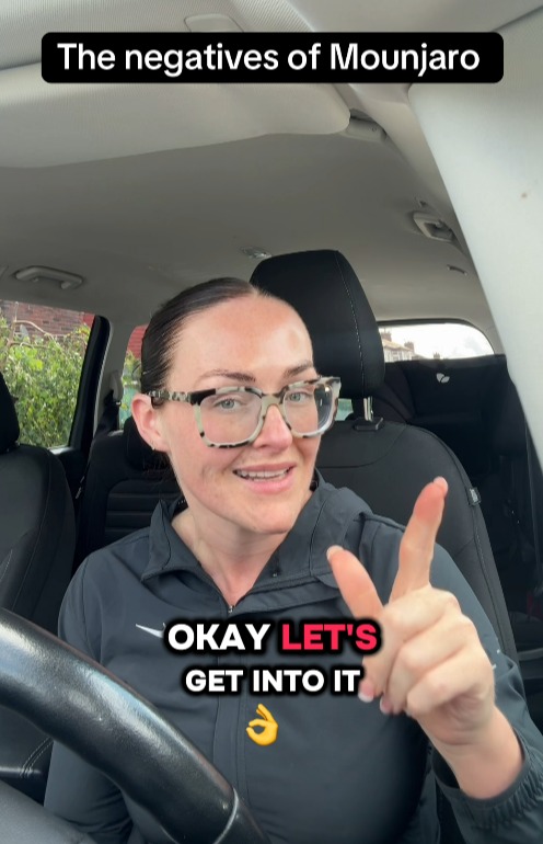 A woman in a car, wearing glasses and a black jacket, making a hand gesture, with text overlay "The negatives of Mounjaro" and "OKAY LET'S GET INTO IT".