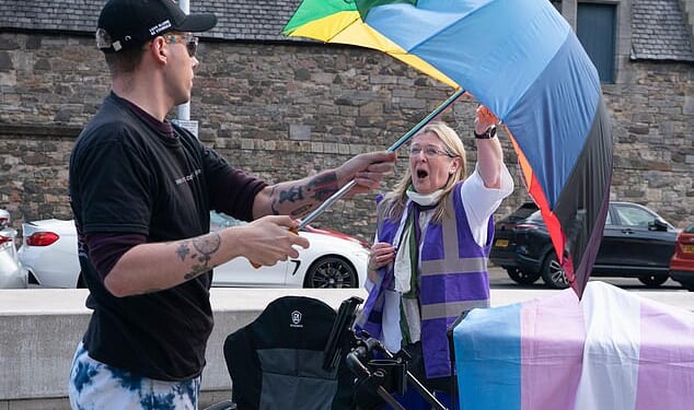 For Women Scotland's Susan Smith and trans activist Tom Harlow