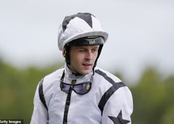 Jockey Clifford Lee has been rushed to hospital with a neck injury after a motorbike crash