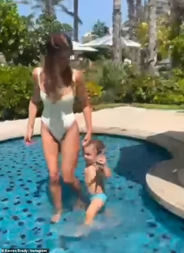 Karren Brady showed off her body transformation on Instagram in a white swimsuit as she spent quality time with her grandson on Sunday