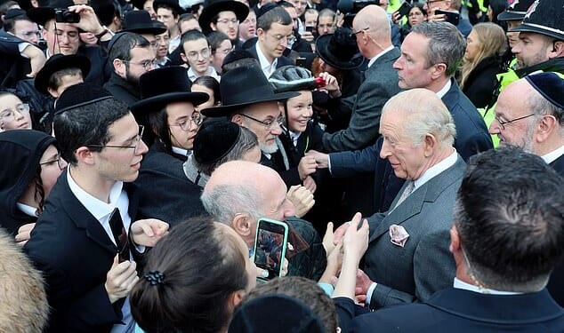King Charles III meets people outside Heaton Park Hebrew Congregation Synagogue today