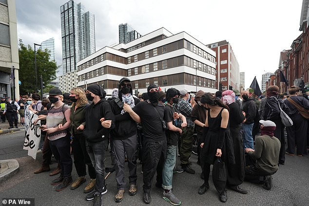 The Home Office has 'squandered' billions of pounds on asylum hotels, a damning report has found (Pictured: A protest defending migrants at the Thistle City Barbican Hotel in London, August 2025)