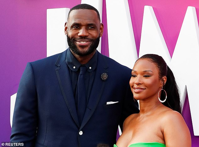 Cast member Lebron James, his wife Savannah Brinson and daughter Zhuri James attend the premiere for the film Space Jam: A New Legacy in Los Angeles, California, U.S. July 12, 2021. REUTERS/Mario Anzuoni