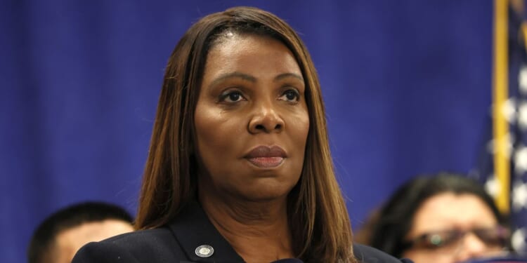New York Attorney General Letitia James stands silently during a news conference in New York City on Oct. 21, 2025.