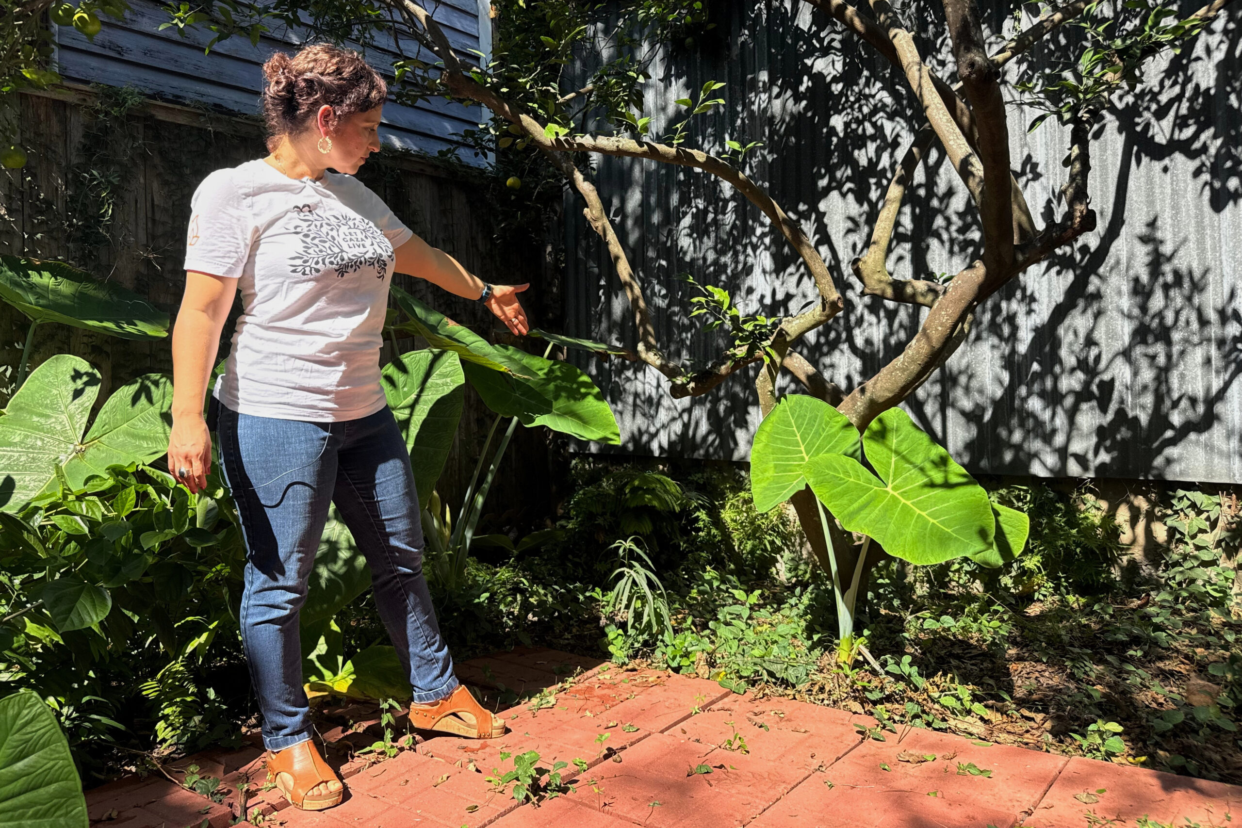 New Orleans resident Daniella Santoro points out the spot where her family discovered a 1900-year-old Roman artifact.