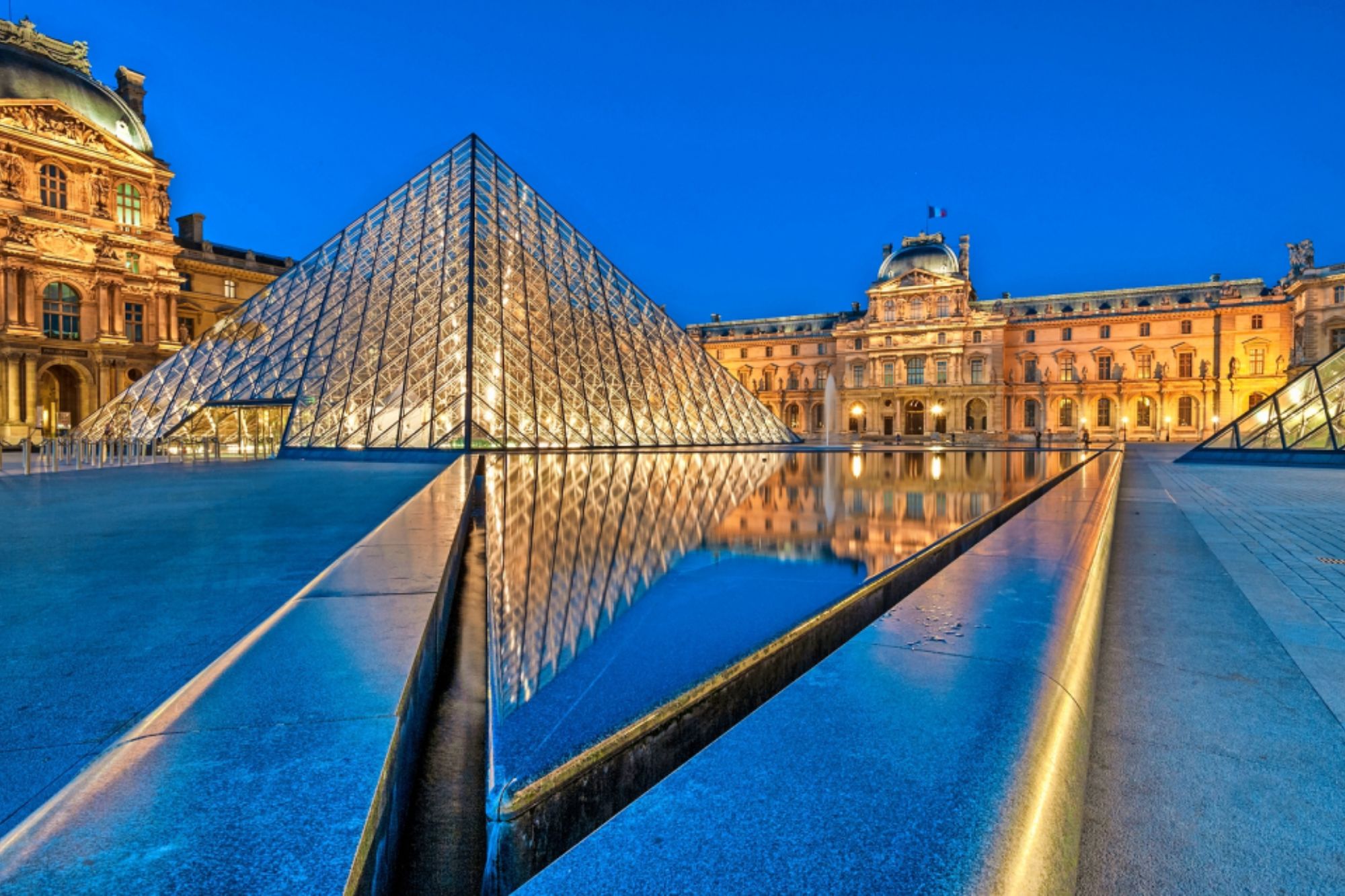 An image collage containing 1 images, Image 1 shows Louvre Museum and Pyramid at night Paris