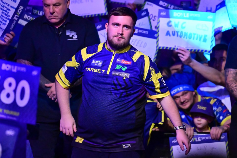 Luke Littler entering the arena during the World Grand Prix Darts Final.