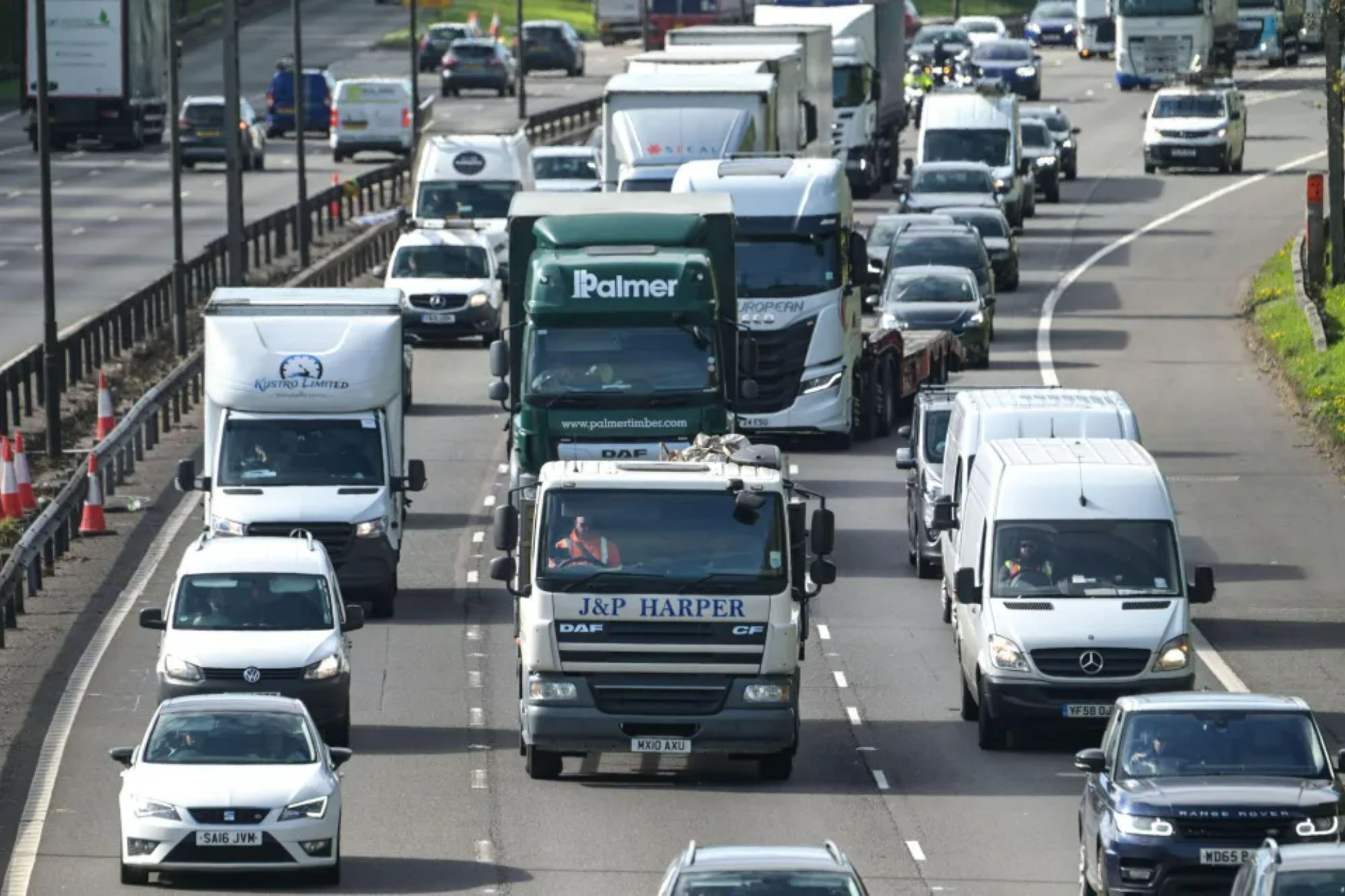 An image collage containing 1 images, Image 1 shows Heavy traffic building on the M5 Motorway near West Bromwich