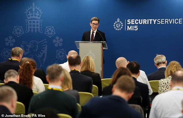 Sir Ken McCallum speaks to reporters at the annual Director General's Speech in London today
