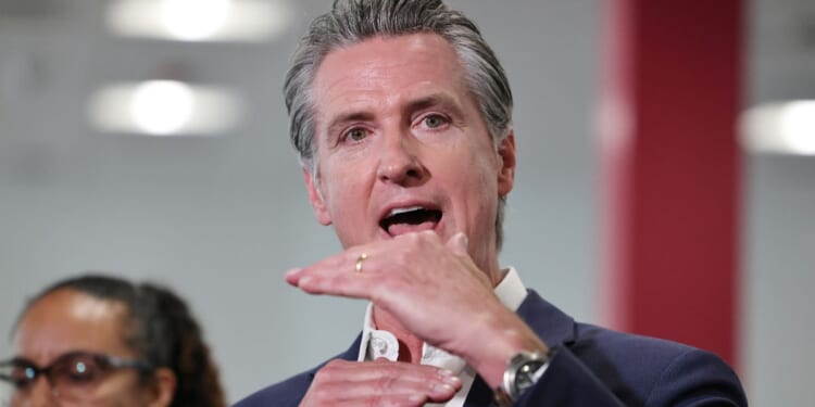 California Governor Gavin Newsom speaks to the media at Belvedere Middle School in Los Angeles on Oct. 8, 2025.
