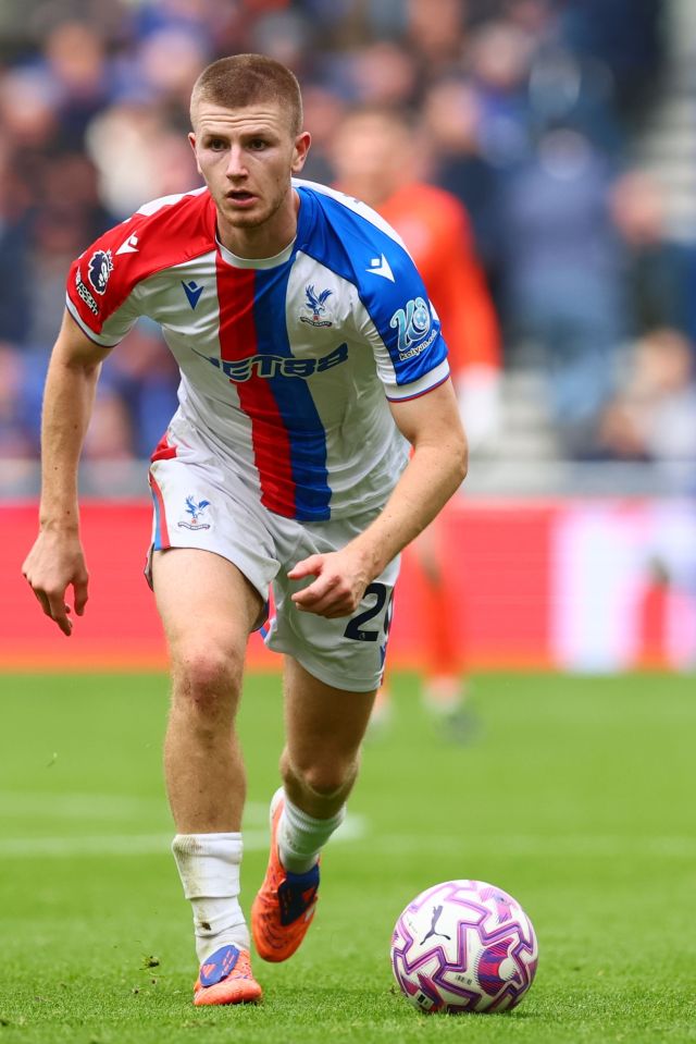 Adam Wharton of Crystal Palace on the field with a soccer ball.