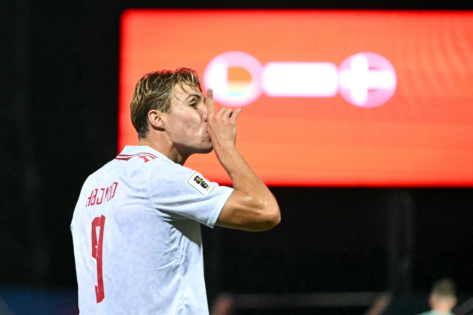 Rasmus Hojlund celebrating after scoring a goal for Denmark.