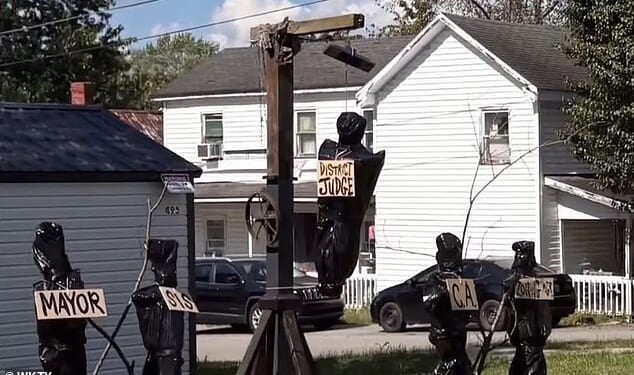 Kentucky State Police removed the mock body bags and other decorations from Marcum¿s yard as evidence after residents described the display as threatening