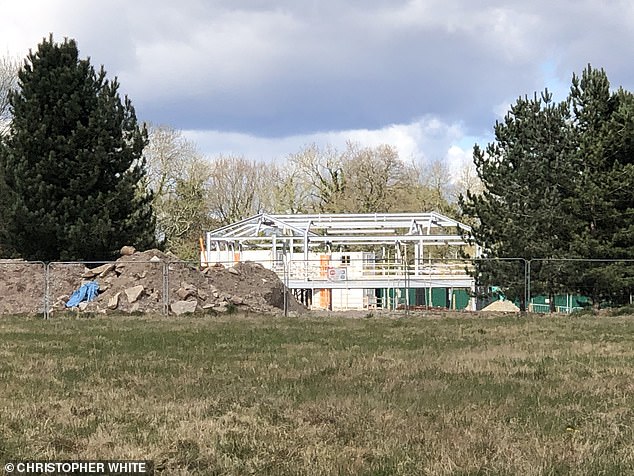 Pictures taken of the site in 2022 show the mansion's steel frame being erected