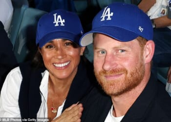 Meghan Markle, left, glimmered from the bleachers last night as she enjoyed an atmospheric evening watching the LA Dodgers baseball game with Prince Harry, right, just hours after launching a festive collection for her lifestyle brand
