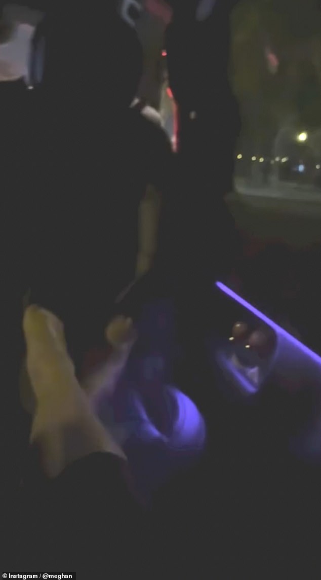 The short clip showed her putting her feet up while being driven through the French capital