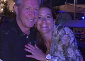 Former Aviva chief executive David Barral, 63, (pictured with his wife Angela) was killed when his £160,000 Aston Martin careered into a tree