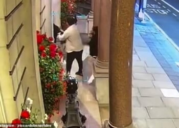 This is the moment a US events company boss was ambushed in Mayfair by crooks who snatched his watch from his wrist