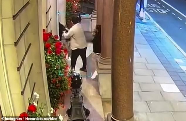 This is the moment a US events company boss was ambushed in Mayfair by crooks who snatched his watch from his wrist