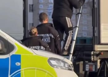 A group of migrants were travelling in a lorry (pictured) when they were discovered at a truck stop at Waltham Abbey on Tuesday, it is understood