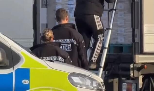 A group of migrants were travelling in a lorry (pictured) when they were discovered at a truck stop at Waltham Abbey on Tuesday, it is understood