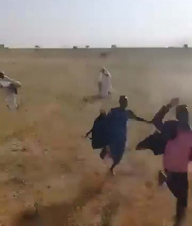 Screen grab shows unarmed civilians running away as they are chased by paramilitaries