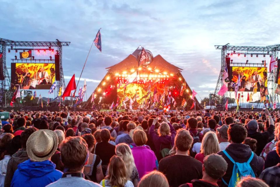 An image collage containing 1 images, Image 1 shows The Who Playing On The Pyramid Stage at Night Glastonbury Festival UK