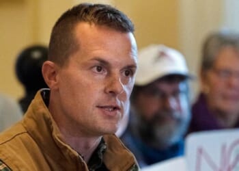 Rep. Jared Golden, a Maine Democrat, speaks at a news conference, Nov. 1, 2022, at the Statehouse in Augusta, Maine.