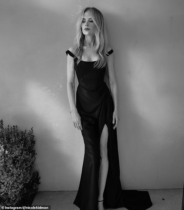 The 58-year-old movie star slipped into a skintight black dress with a slit up one leg that made the most of her size two figure