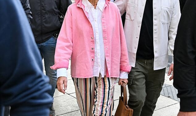 Pictured: Gisele Pelicot arrives at appeal trial for Husamettin Dogan in Nimes with her son Florian Pelicot