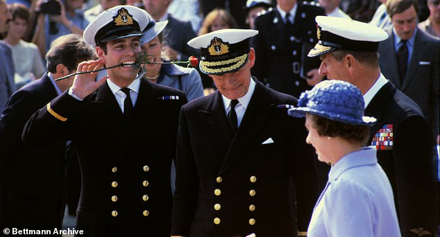 Prince Andrew jokes around next to Prince Philip after returning from the Falklands in 1982