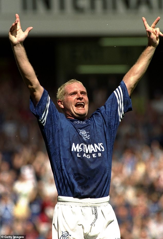 Paul is seen playing for Ranger in a match against Steaua Bucharest at Ibrox Stadium in Glasgow, Scotland in July 1995