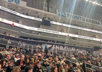 A Pittsburgh Penguins fan fell from a significant height during a game at PPG Paints Arena