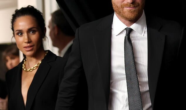 Prince Harry and Meghan Markle walked hand-in-hand as they arrived at a glitzy ceremony in New York where they are to receive an award for their humanitarian work