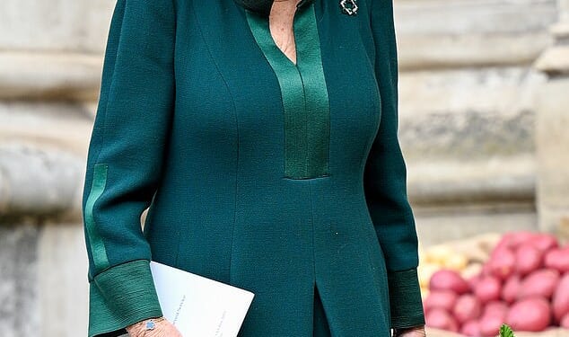 Queen Camilla wore a stylish forest green ensemble today as she arrived at Westminster Abbey to attend the National Harvest Festival Service