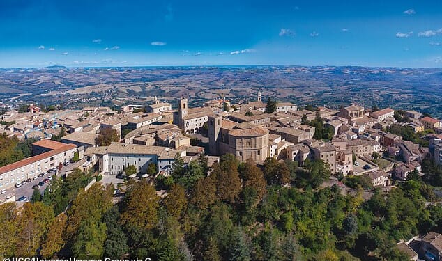 A man who was cleared of raping a teenage girl in Macerata, Italy, because a judge ruled that she should have known what could have happened to her has finally been jailed after the ruling was overturned. File photo shows a view of the town centre, Macerata