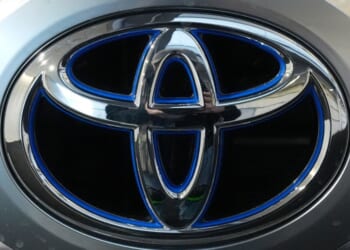 A Toyota logo is seen on a Toyota Tundra HV 4x4 at the Pittsburgh International Auto Show in Pittsburgh, Pennsylvania, on Feb.15, 2024.