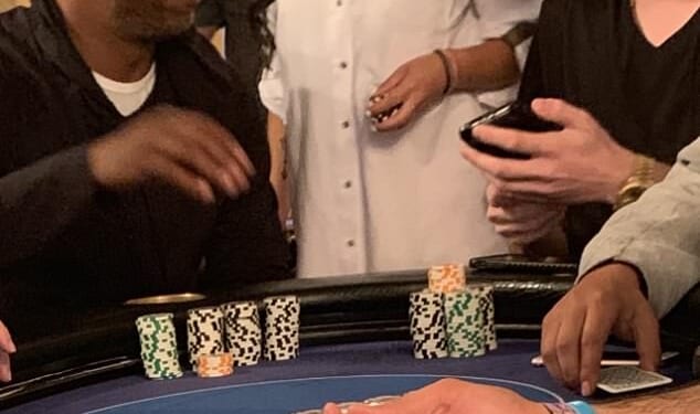 Chauncey Billups (left) was arrested for the alleged illegal gambling operation. The NBA star is pictured playing poker alongside Sophia Wei and Saul Becher, who have also been named by prosecutors