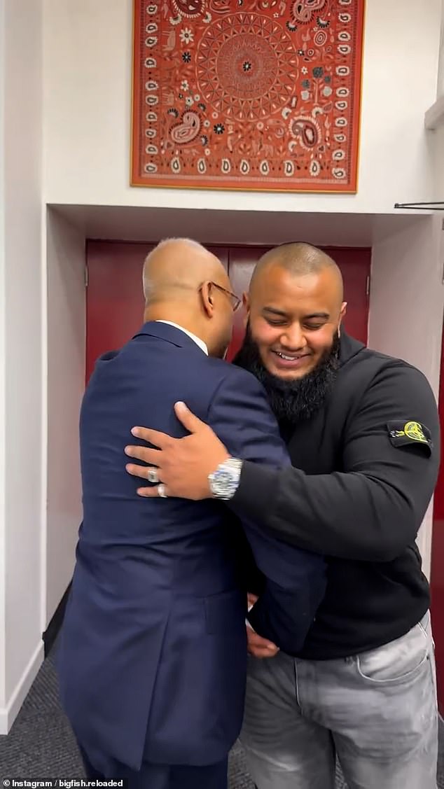 In another video, he was seen shaking hands and hugging controversial Tower Hamlets mayor Lutfur Rahman