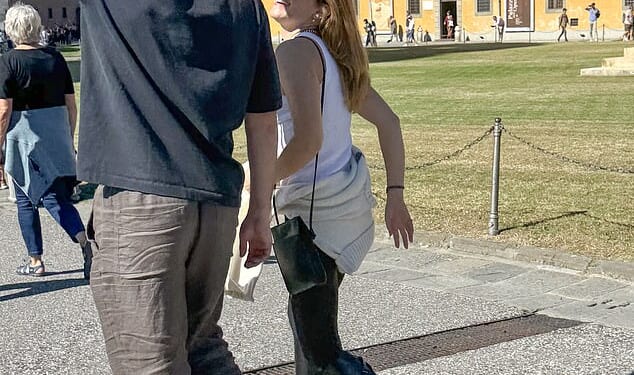 Emma, 35, was pictured looking happy and carefree with a man who can now be identified as Austin Kevitch, a relationships guru courtesy of his role as CEO of the dating app Lox Club