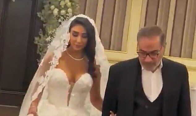 The wedding dress of one of Ayatollah Ali Khamenei's senior advisors has sparked fury in Iran with people accusing the Islamic Republic official of double standards