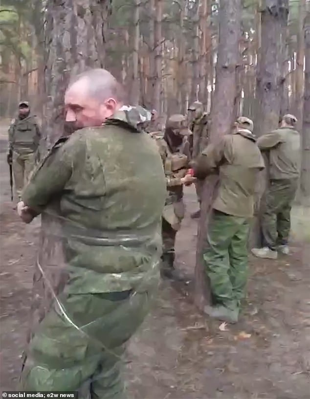 Last year, a video purported to show Russian troops being taped to a tree and beaten. In June, a group of Putin's men battling in Kursk surrendered to Ukrainian paratroopers, telling them that 'abuse in units is worse than captivity